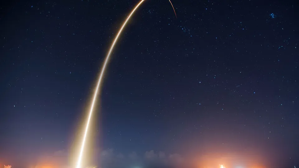 Long-exposure photo of a rocket launch arcing into a starry night sky